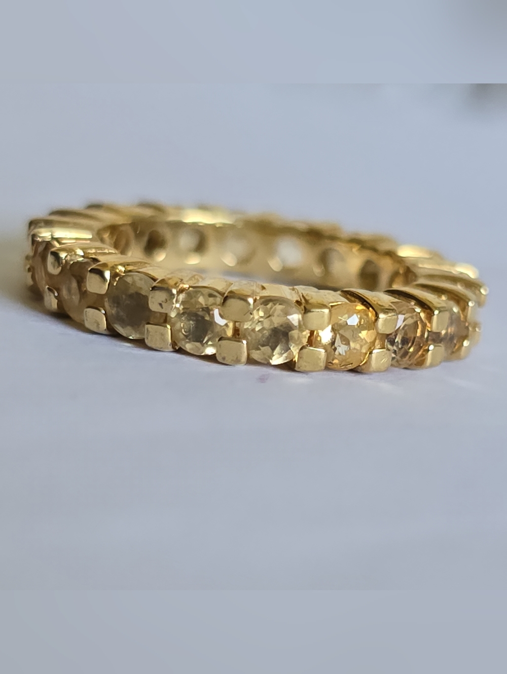 925 gold tone band ring with yellow stones
